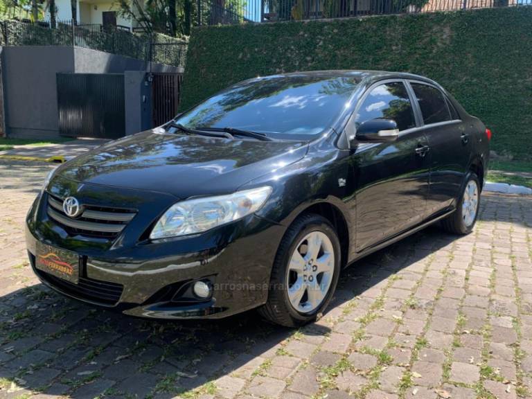 TOYOTA - COROLLA - 2010/2011 - Preta - R$ 59.000,00