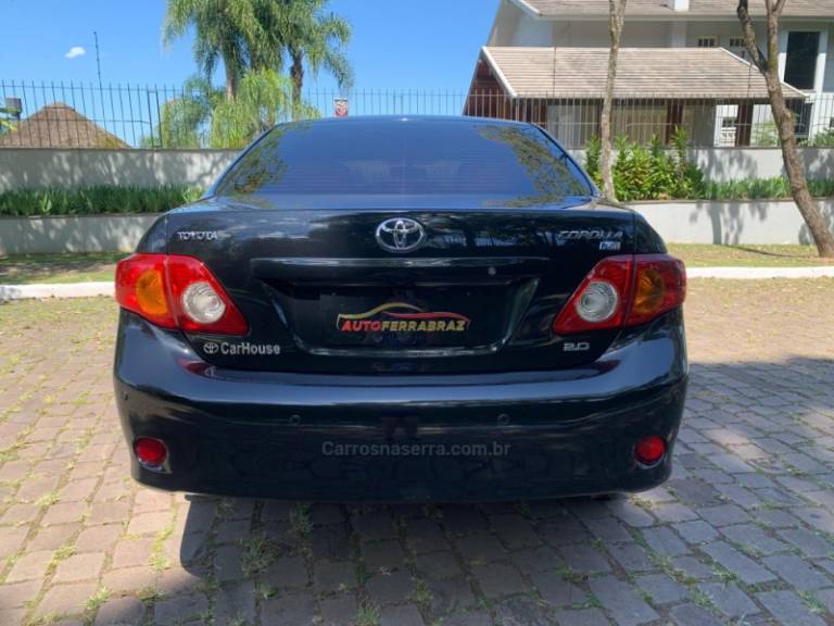 TOYOTA - COROLLA - 2010/2011 - Preta - R$ 59.000,00