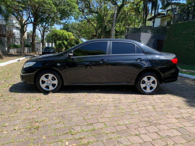 TOYOTA - COROLLA - 2010/2011 - Preta - R$ 59.000,00